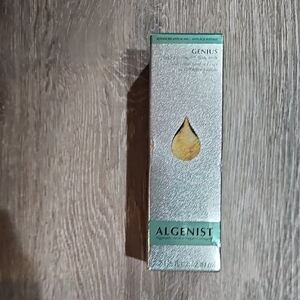 Algenist Silver Packaging with Teal Accent and Yellow Graphic